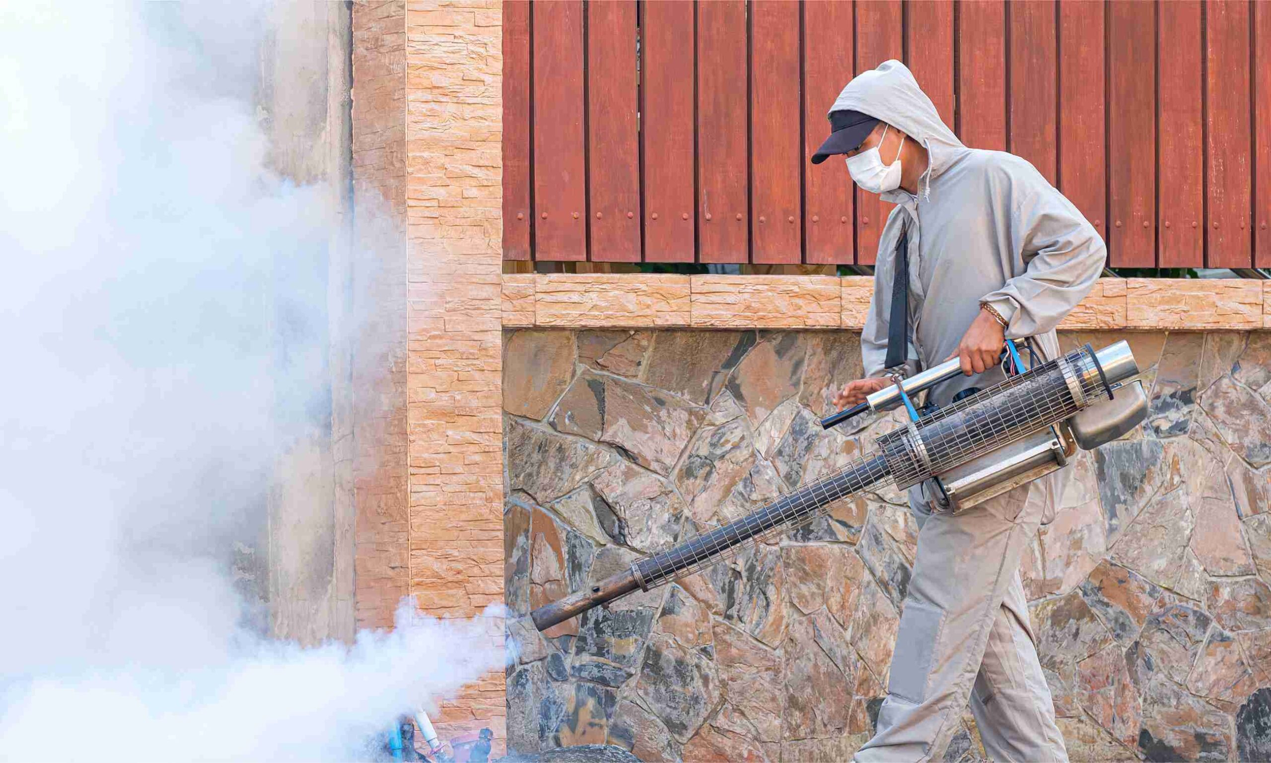 outdoor healthcare worker spraying chemical to rem 43wpy3s
