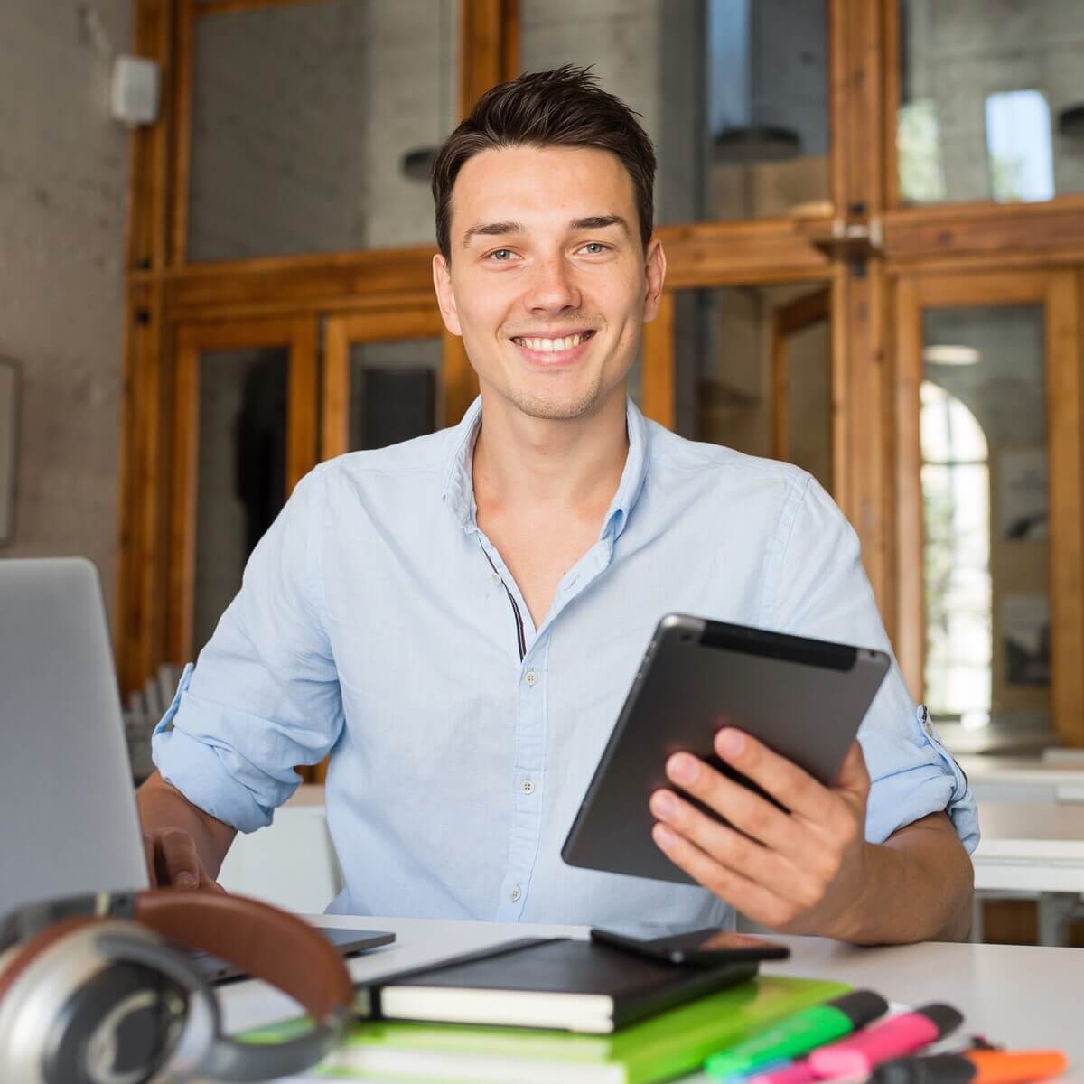 happy young confident man working on laptop 2023 11 27 04 58 31 utc.jpg